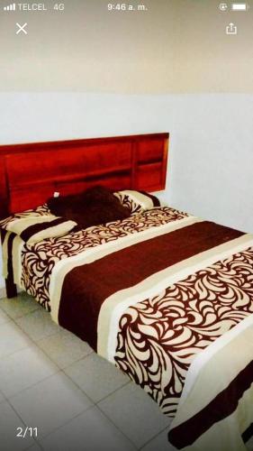 1 letto matrimoniale in una camera da letto di casa cómoda y céntrica a Tuxtla Gutiérrez