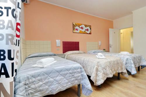 a hospital room with three beds in it at Antico Platano in Rome