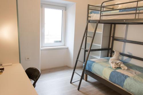 Postel nebo postele na pokoji v ubytování Koper2stay