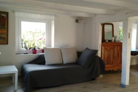 Posezení v ubytování Chambre dans ancienne Ferme rénovée