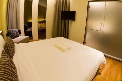 Postel nebo postele na pokoji v ubytování Mood Hotel