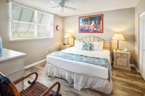 Postel nebo postele na pokoji v ubytování Sunrise Suites Tahiti Suite #104