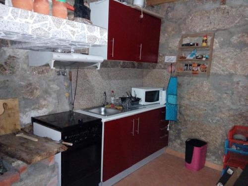 Kuchyň nebo kuchyňský kout v ubytování Casa de campo