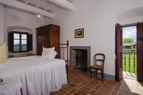 Ένα ή περισσότερα κρεβάτια σε δωμάτιο στο Chiantivillas Poggio a Vento