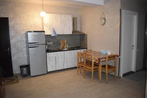 Una cocina o zona de cocina en bakuriani резиденс
