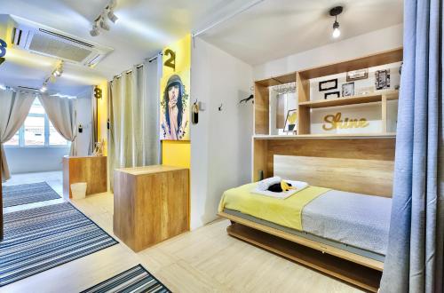 Postel nebo postele na pokoji v ubytování hipstercity hostel
