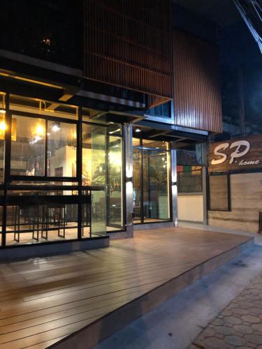 a store front of a building at night at SP Home BangSaen in Bangsaen