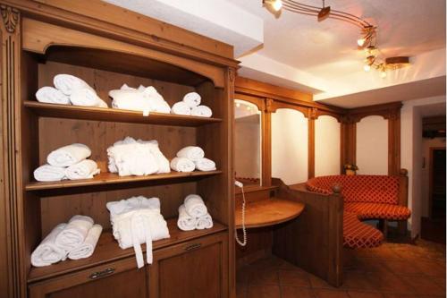 a room filled with lots of white towels at Hotel Central in Ischgl