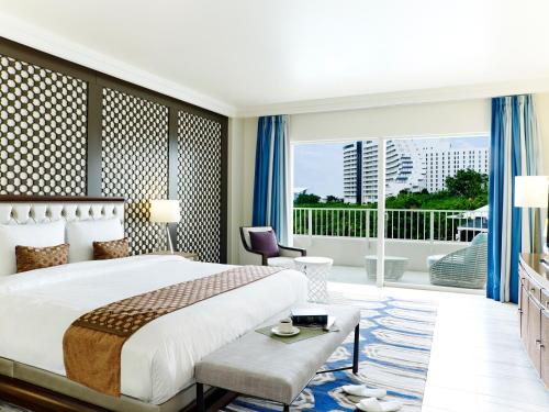 Vuode tai vuoteita majoituspaikassa Lotte Hotel Guam
