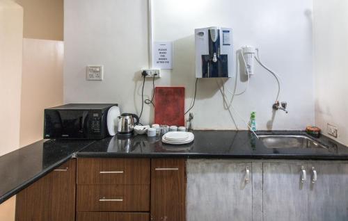 Η κουζίνα ή μικρή κουζίνα στο Moustache Goa Cowork Hostel