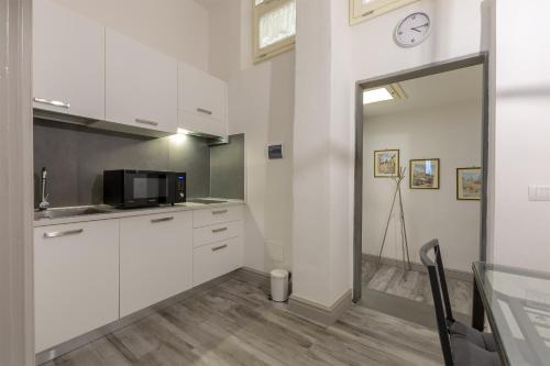 Una cocina o kitchenette en Ponte Vecchio's Nest