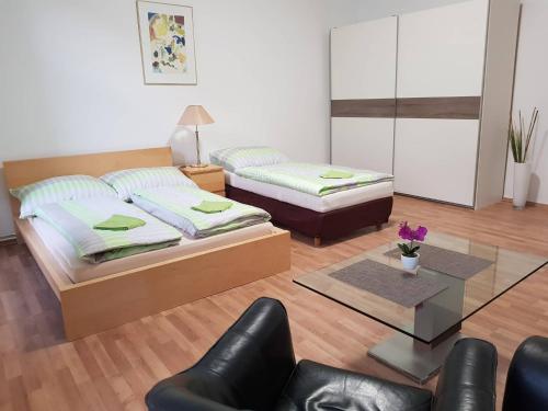 Posteľ alebo postele v izbe v ubytovaní Ferienwohnung Schloessel 26/16