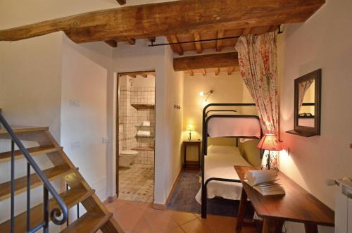 Ένα ή περισσότερα κρεβάτια σε δωμάτιο στο La Torre