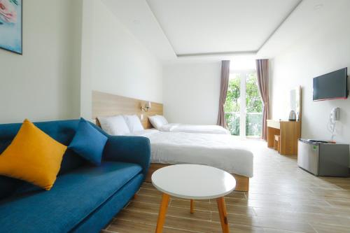 TV a/nebo společenská místnost v ubytování Lacami Dalat Hotel