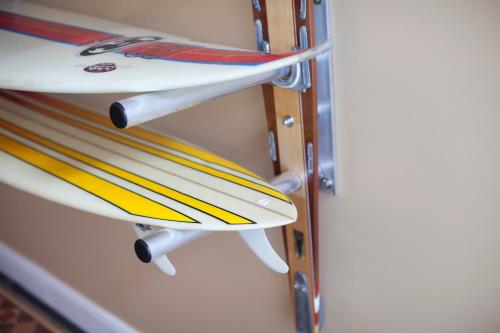 a group of surfboards sitting on a rack at The Salt House, Fore Street in Ilfracombe
