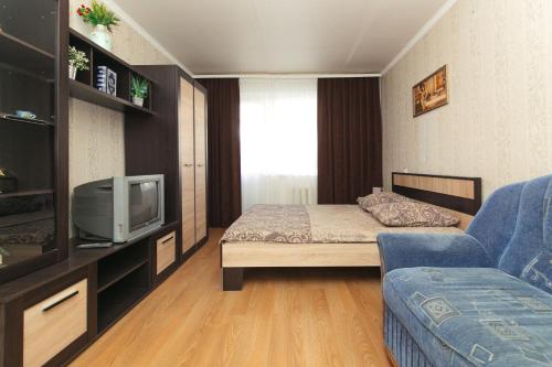 Μια τηλεόραση ή/και κέντρο ψυχαγωγίας στο Apartments Faraon Centr on Zasumskaya