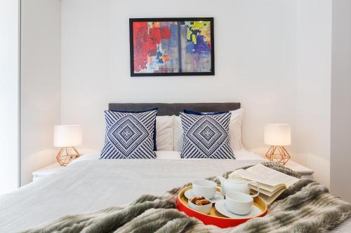 Llit o llits en una habitació de Modern apartments close to Colombia Road Market