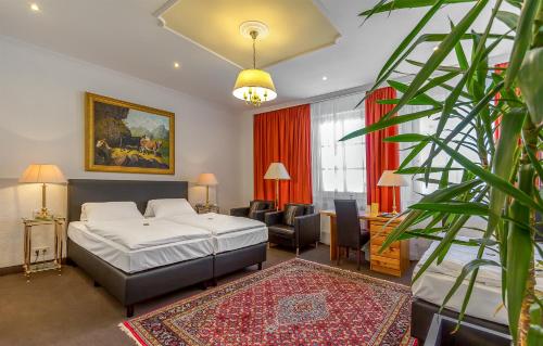 Postel nebo postele na pokoji v ubytování Hotel Adler