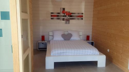 En eller flere senge i et værelse på Maison tout confort 6 personnes à 300m de la plage - Clim & Wifi