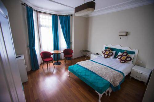 Ένα ή περισσότερα κρεβάτια σε δωμάτιο στο The Void Hotel