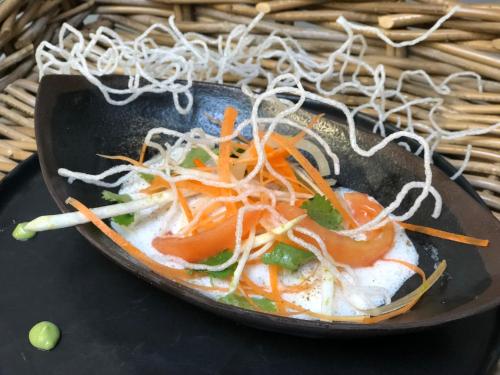 a plate of food with carrots and other vegetables at Logis des Sittelles in Montfort-le-Gesnois