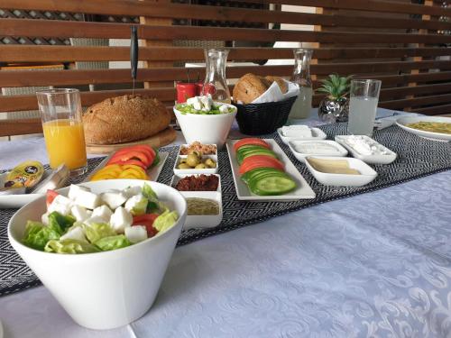 a table with a tray of food on a table at Spat Beach in Bat Yam