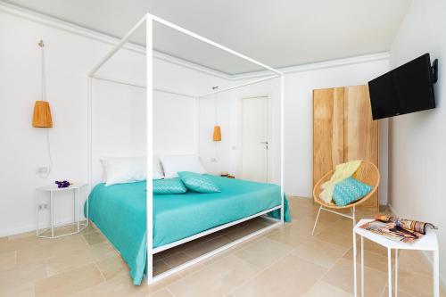 Postel nebo postele na pokoji v ubytování Doneduà B&B