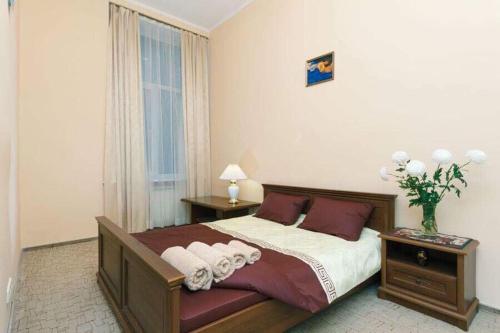 Posteľ alebo postele v izbe v ubytovaní Great one bed on Mykhaylovskaya str