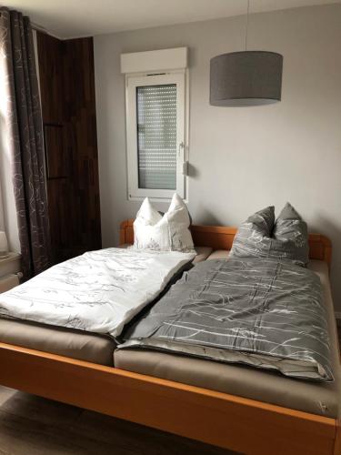 Postel nebo postele na pokoji v ubytování Ferienwohnung A.Engelhardt