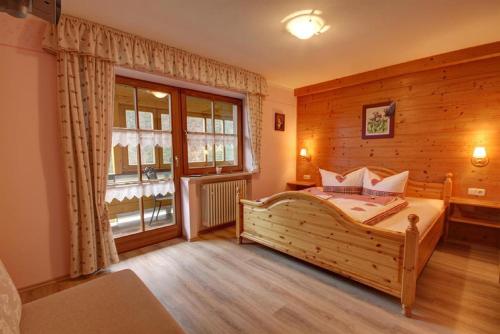 Ліжко або ліжка в номері Haus Holzner-Nagl