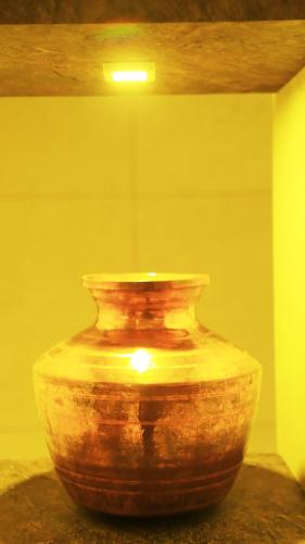 a large vase sitting on a table in a room at HOTEL KEK GRAND PARK in Chennai