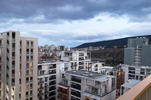 a view of a city with buildings at 7th HEAVEN Apartment in Central Tbilisi in Tbilisi City