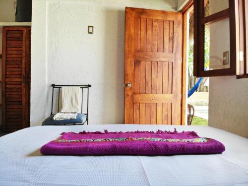 Letto o letti in una camera di Kinta Kan Hotel Boutique Cozumel