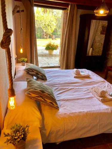 Postel nebo postele na pokoji v ubytování Agroturismo Can Guillo