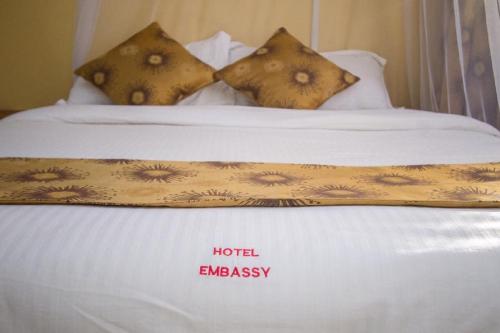 Cama o camas de una habitación en Hotel Embassy