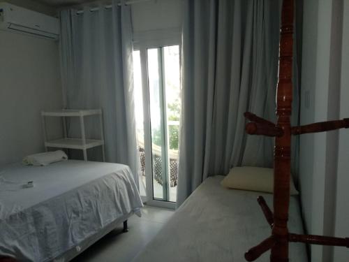A bed or beds in a room at Apartamentos Juliel
