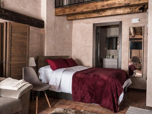 Postel nebo postele na pokoji v ubytování AbenRazín Turístico