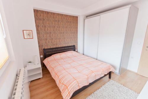 Krevet ili kreveti u jedinici u okviru objekta Orange Apartment