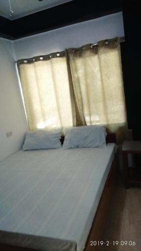 Postel nebo postele na pokoji v ubytování Jalyn's Resort Sabang