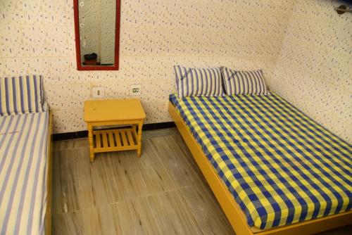 Postel nebo postele na pokoji v ubytování Perfect Guest House