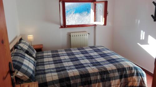 Postel nebo postele na pokoji v ubytování B&B Bucaneve