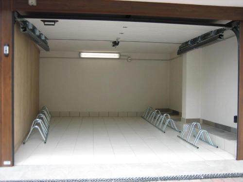 a large empty room with chairs in it at Residence Casa Federica in Valfurva