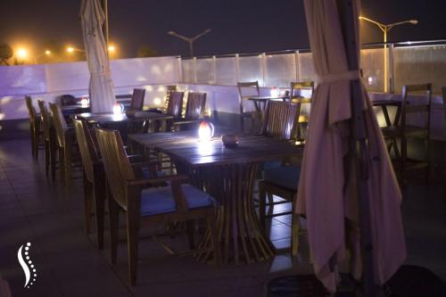 Restorāns vai citas vietas, kur ieturēt maltīti, naktsmītnē Hôtel Seaside