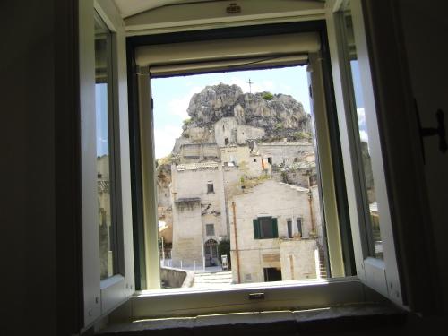 a view ofhenshenshenshenshens city from a window at Agli Archi Dimore Storiche in Matera