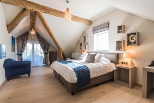 Katil atau katil-katil dalam bilik di Koru Hôtel & Private Wellness