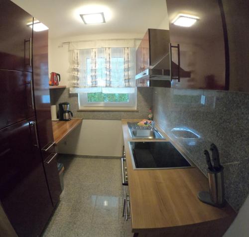 Dapur atau dapur kecil di Bonsai-Apartment II