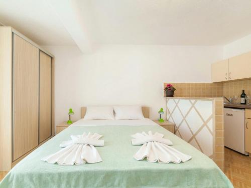 Ένα ή περισσότερα κρεβάτια σε δωμάτιο στο Hana Accommodation