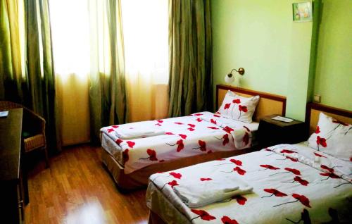 Кровать или кровати в номере Guest House Misha