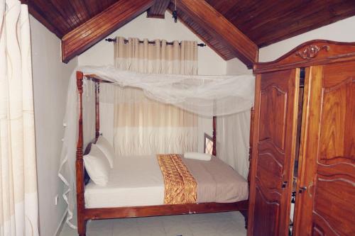 Un pat sau paturi într-o cameră la A&A Homestay