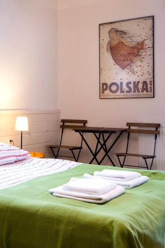 Postel nebo postele na pokoji v ubytování Malowane Wierchy